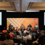 Fluence panel discussion captivates audience at Photo x conference with dual-screen presentation on 'Data Walkthrough: Comparing Old SAR to New Rotated Studies,' showcasing Austin-based LED lighting innovations for optimized cannabis cultivation.