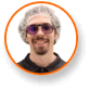 Alex Gonzalez in hair net and glasses, smiling, expert in cannabis lighting technology.