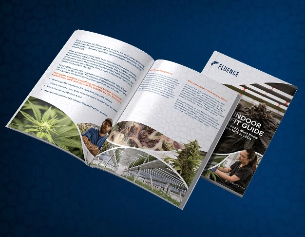 Open magazine on blue surface with cannabis cultivation, LED grow lights, and lighting technology articles.